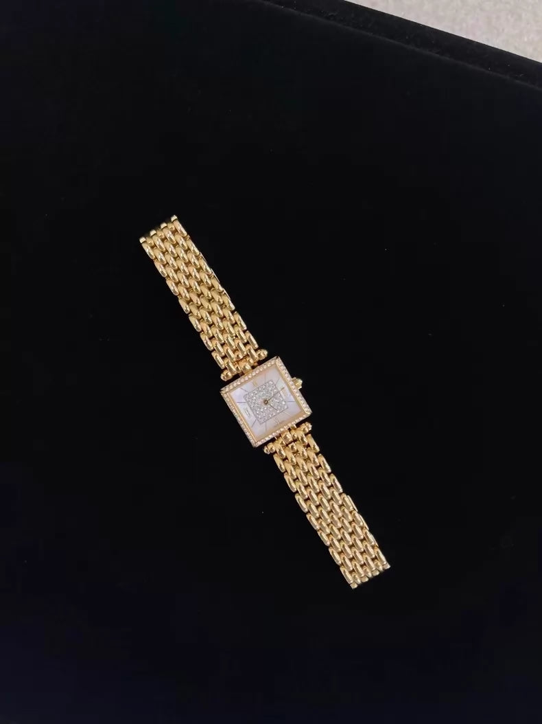 Van Cleef & Arpels mother-of-pearl and diamond watch in 18K gold with genuine diamonds