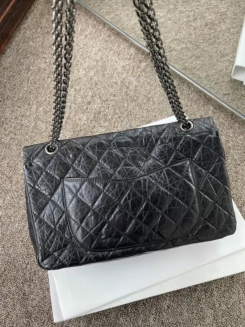 Chanel black and silver Maxi includes dust bag