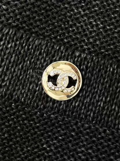 Chanel 23S black knit wide-leg pants with rhinestone buttons