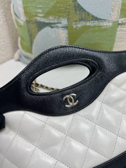 Chanel black and white panda-themed 31 mini nano bag