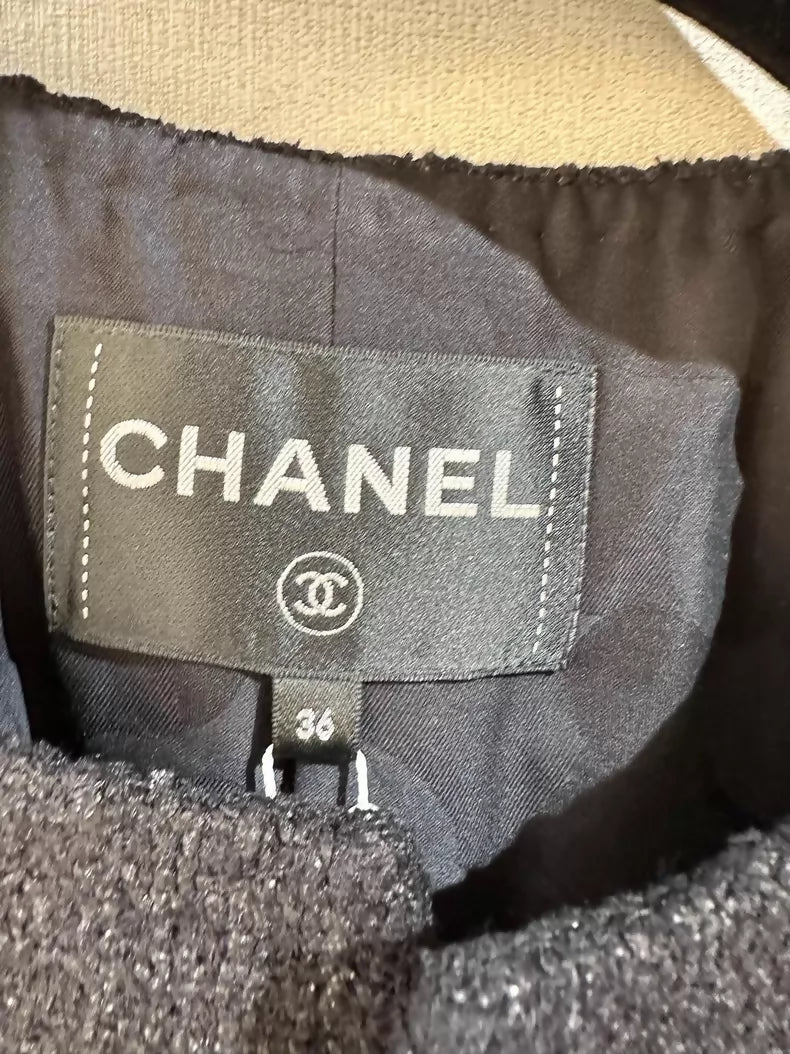 Chanel's early spring black two-piece tuxedo jacket