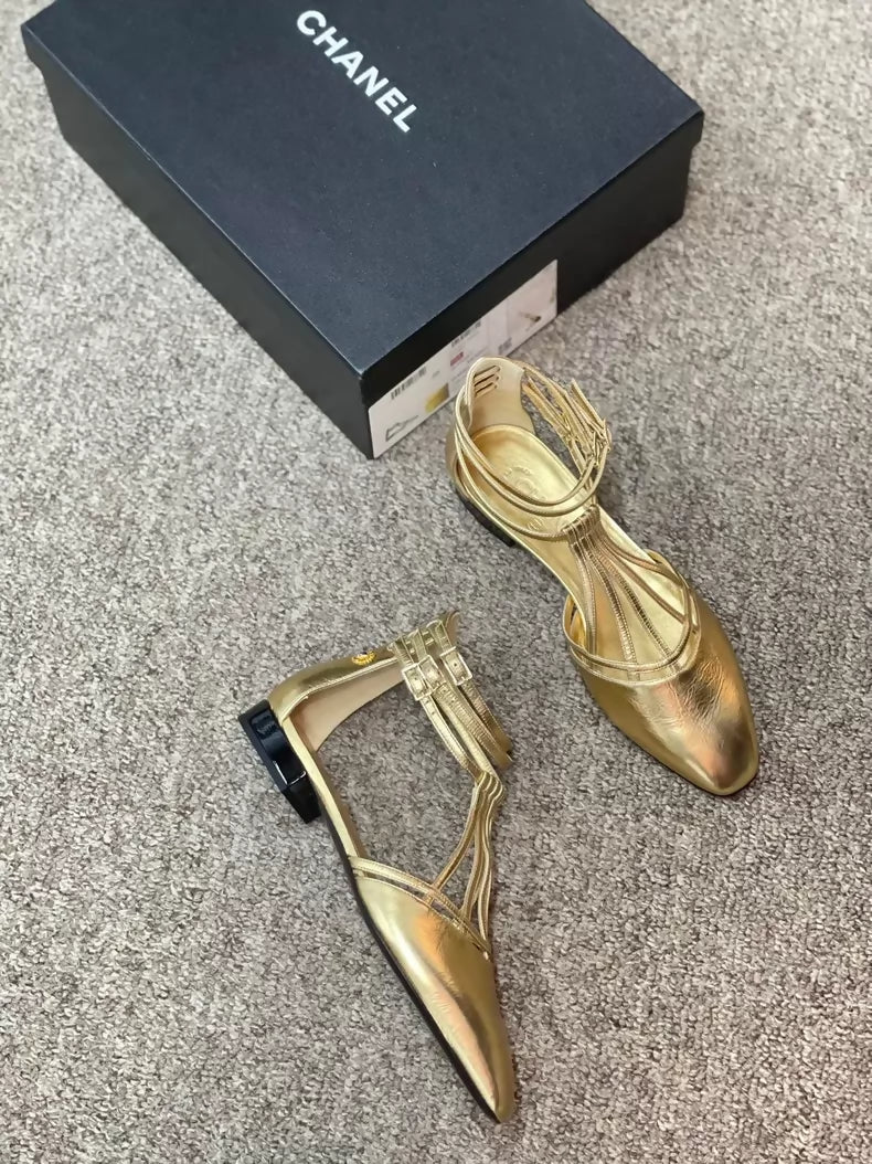 Chanel Karl Lagerfeld gold shoes