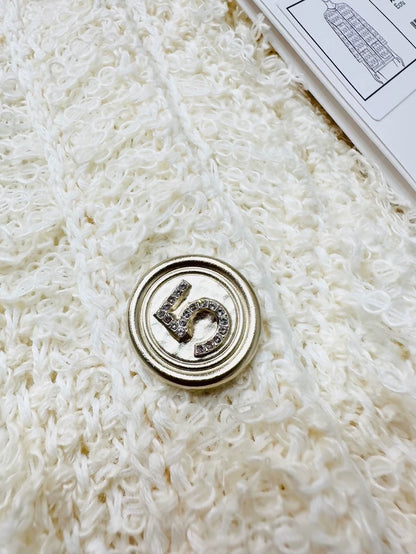 Chanel 21S ecru fringed knit cardigan