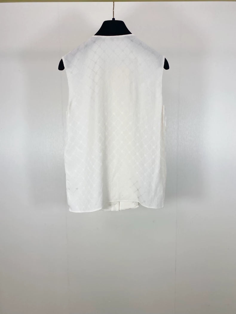 Chanel 21A beige quilted logo silk top
