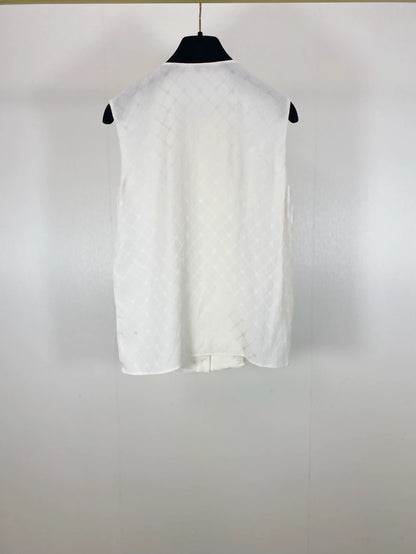 Chanel 21A beige quilted logo silk top