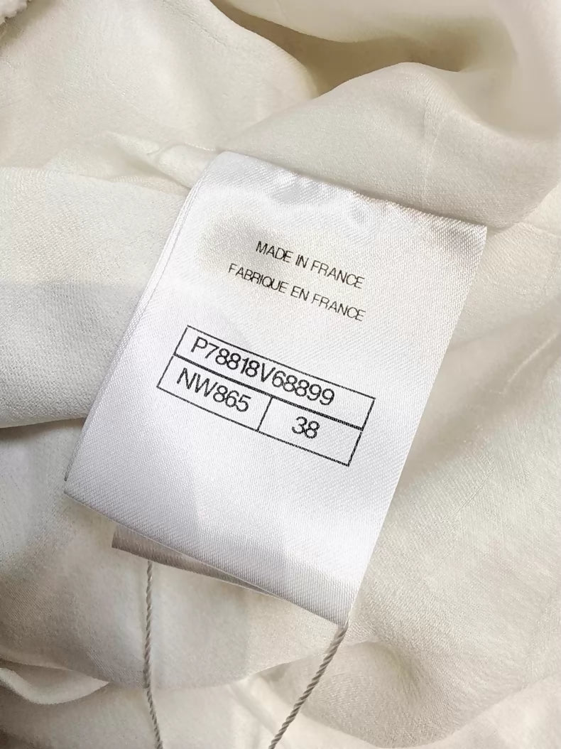 Chanel 25C white coat with gold thread trim