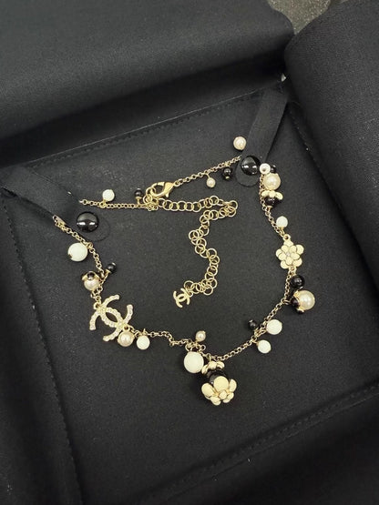 Chanel exquisite black and white enamel floral choker necklace