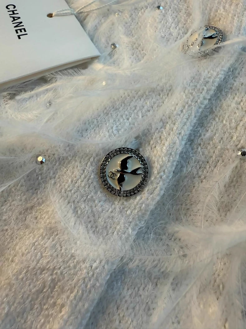 Chanel 25s white feather cardigan