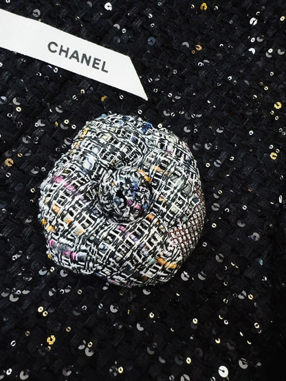Chanel camellia brooch in blue-grey mixed tweed
