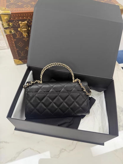 Chanel 25S black leather top handle bag gold hardware